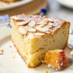 Delicious moist almond cake on a plate.